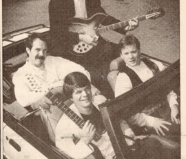We were "The System" ca. 1990, then because that name was already taken by a nationally known band, we were "The Rockunes" - a silly name, but a great party band! Notice that Gregg and I are identified incorrectly in the caption (plus his name is misspelled).