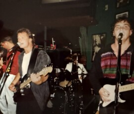 The System at a club in Charlotte. Front: Gregg and Danny. Background: Flip Moore and Bruce.